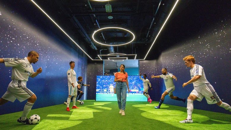 Real Madrid World features roller coasters and interactive exhibits.