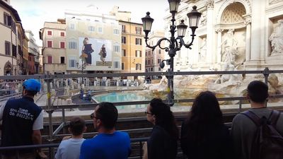 As construction for the walkway is planned, the Trevi Fountain is currently being barricaded to for a two-month clean up.