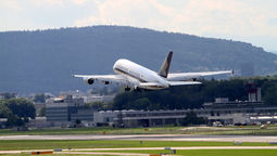 SIA presses ahead with expansion despite fuel costs weighing on earnings.