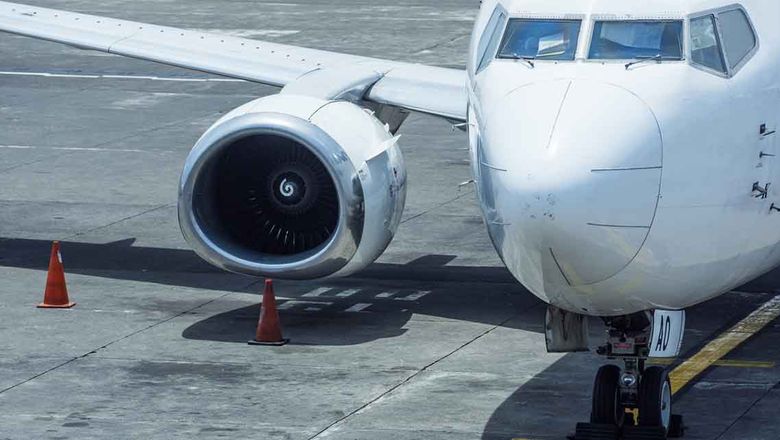 An airplane at a parking apron.