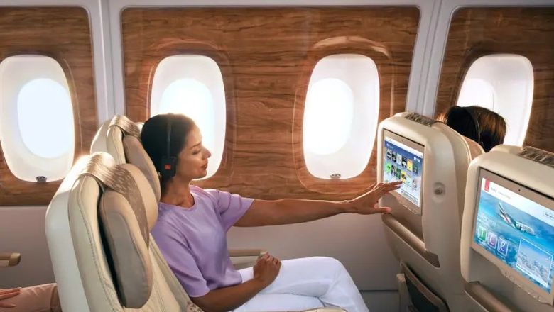 Spotify playlists on Emirates inflight entertainment system include hip-hop, jazz, and Latin hits, while podcasts span business, true crime, entertainment, and celebrity interviews.