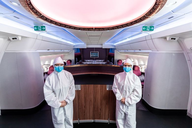 Qatar Airways’ cabin crew in full protective gear