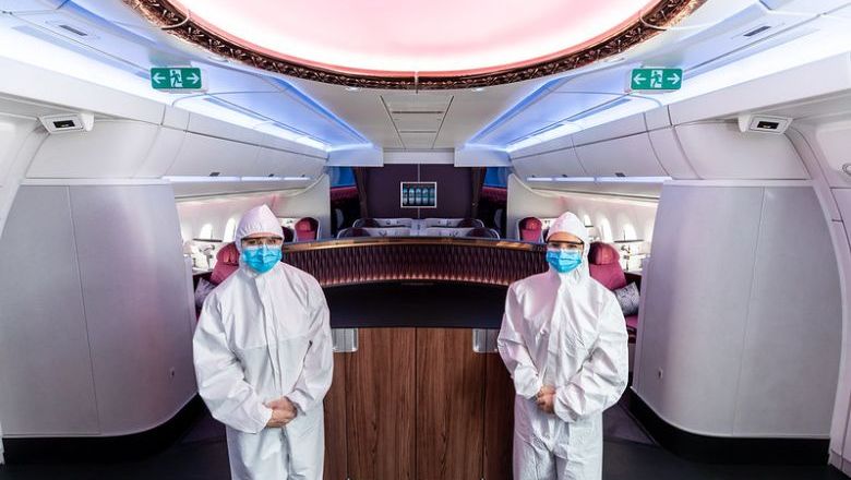Qatar Airways’ cabin crew in full protective gear