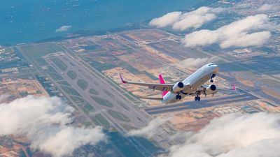 Increased links to 15 cities in China, while Changi opens earlier check-ins ahead of travel surge.