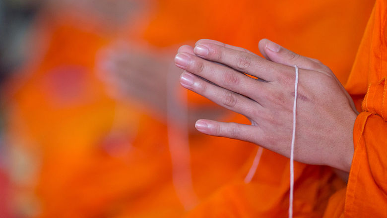Near-miss for monks as plane door crashes to earth