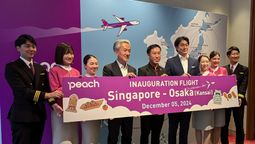 Peach Aviation’s Satoru Endo (fourth from left), EU Holidays' Alan Ang (centre), and Peach Aviation’s Motoyuki Fukushima announcing the airline’s launch of Singapore-Osaka flights.