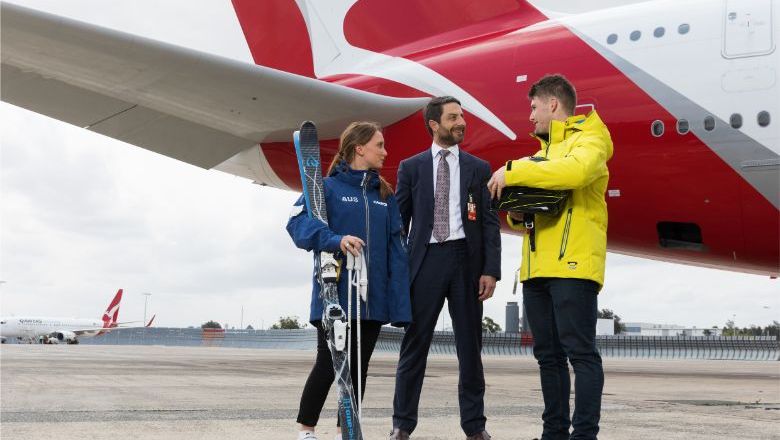 Qantas International CEO Tino La Spina with Australian Olympic bobsleigh team Hayden Smith and Australian Olympic skier Taylah O’Neill.