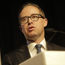 Why is Qantas slashing payout for former CEO?