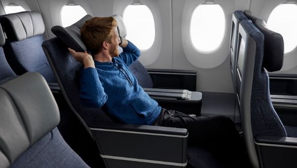 The new premium economy seat comes with a six-way headrest. The new premium economy seat comes with a six-way headrest.