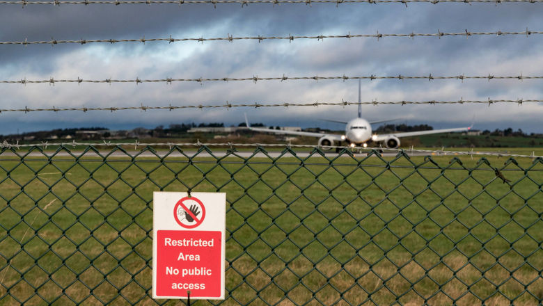 A former sheep shearer and boxer said he noticed the barrel of a shotgun while the boy was speaking with a flight attendant.