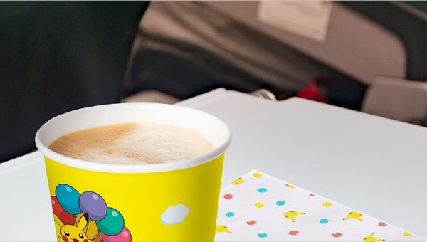 A flight that is everything Pokemon right down to the Pikachu printed paper cup and serviettes. A flight that is everything Pokemon right down to the Pikachu printed paper cup and serviettes.