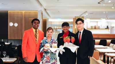 Qantas lounge staff at Changi Airport bring out the festive goodies.