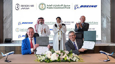 Boeing signs contracts with Riyadh Air CEO Tony Douglas.