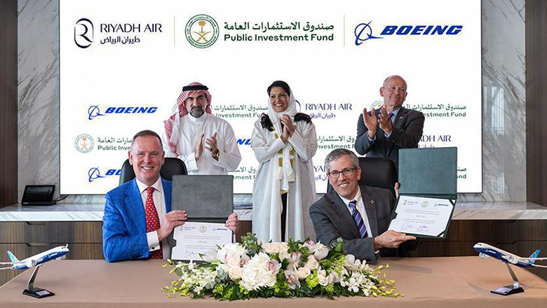 Boeing signs contracts with Riyadh Air CEO Tony Douglas.