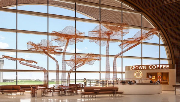 Brown Coffee features Sopheap Pich’s bamboo and metal art installation, with light-changing sculptural forms creating a dynamic, photogenic backdrop for travellers’ coffee breaks and photos. Brown Coffee features Sopheap Pich’s bamboo and metal art installation, with light-changing sculptural forms creating a dynamic, photogenic backdrop for travellers’ coffee breaks and photos.