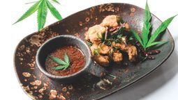 Deep-fried seabass with crispy cannabis and cannabis tamarind sauce, one of the signature dishes at The Service 1921 Restaurant and Bar.