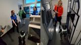 The robot surprised cabin crew by making its way unaided to a window seat.