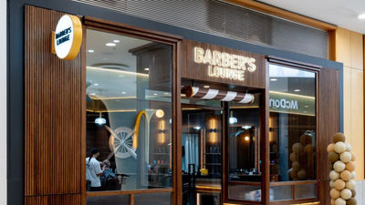 The barber’s lounge at Sydney Airport provides premium grooming services.