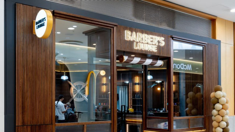 The barber’s lounge at Sydney Airport provides premium grooming services.