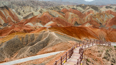 The majestic Danxia landform in Zhangye, with a built-in footpath that allows tourists to walk on. The offending tourists entered the forbidden areas by leaping over these fences.