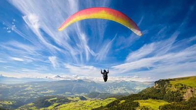Paraglider dies after being blown into cliff at Victoria