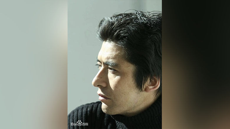 The ethnic Tibetan tourism official (right) who gained fame due to his good looks doesn't mind his new 'celebrity role' if it helps attract more travellers.