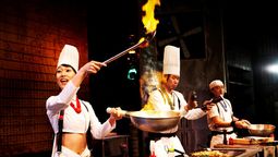 Cookin’ NANTA is a non-verbal Korean stage show mixing comedy, acrobatics, and percussion with kitchen utensils in a high-energy culinary performance.