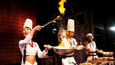 Cookin’ NANTA is a non-verbal Korean stage show mixing comedy, acrobatics, and percussion with kitchen utensils in a high-energy culinary performance.