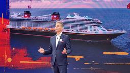 Disney Parks' chairman of experiences and products, Josh D'Amaro unveiling the new vessel that will be homeported in Singapore.