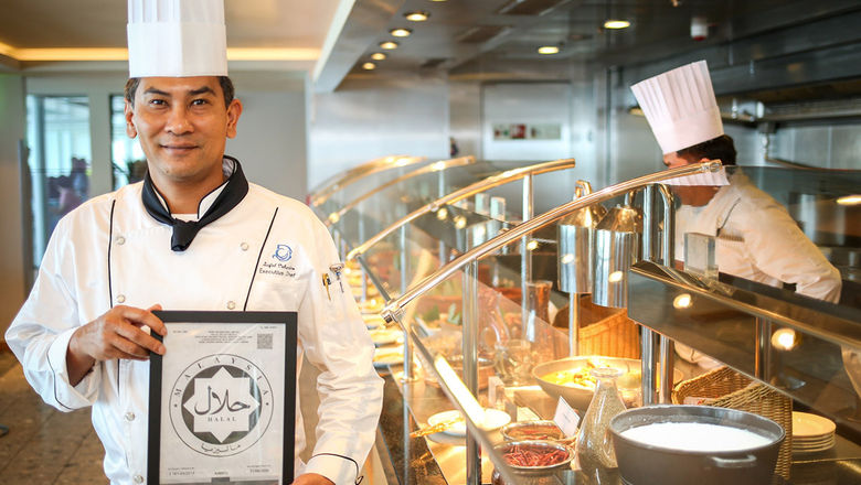 Executive Chef Saifol of Genting Dream with the Halal certification by the Department of Islamic Development Malaysia (Jakim) at the Halal section at The Lido on board Genting Dream homported in Singapore.