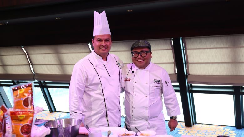 Food will take the spotlight during World Dream's Hari Raya sailings. Above: Dream Cruises executive chef Chris Bartolome with celebrity chef Mel Dean, who will be joining on the 16 May voyage.