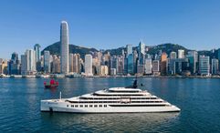 An AI-generated rendering of Emerald Xara in Hong Kong harbour. The yacht is set to join Scenic Group’s fleet in 2028, expanding its Asia-Pacific offering.