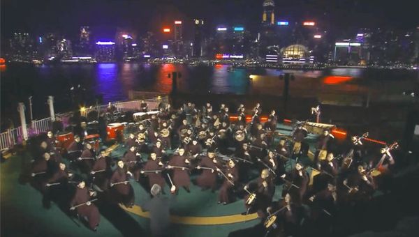 In a first, the Hong Kong Chinese Orchestra performed on Resorts World One's helipad during her maiden voyage out of Victoria Harbour [screengrab from live video].