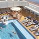The Lido Pool’s retractable glass roof allows guests to enjoy the space year-round in all weather.