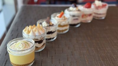 Holland America Line presents mini-jar cakes at Lido Market, a bite-sized rendition of layered jar cakes, introduced for National Cake Day on 26 November.