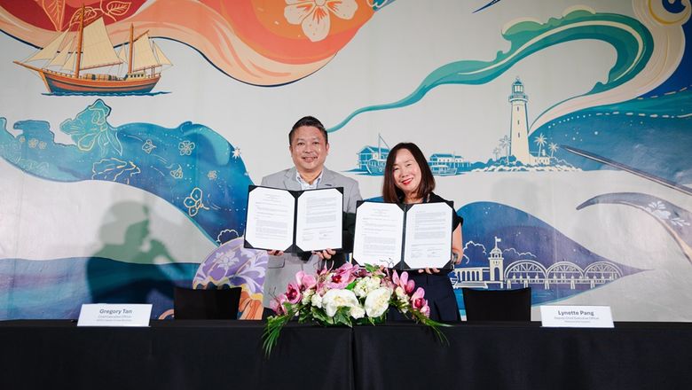 SATS-Creuers CEO Gregory Tan and National Arts Council deputy CEO Lynette Pang at the signing ceremony for the memorandum of understanding.