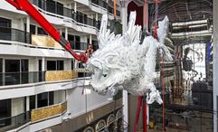 The stainless steel sculpture measures 12 meters in length and 3.5 metres in width and will be  suspended above the ship’s Outdoor World Promenade.