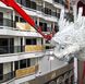 The stainless steel sculpture measures 12 meters in length and 3.5 metres in width and will be  suspended above the ship’s Outdoor World Promenade.