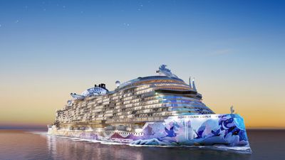 The hull art of Norwegian Luna, designed by street artist ELLE, reflects moonlight on the sea, celebrating humanity's connection to celestial forces.