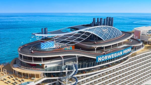 Norwegian Prima, first in Norwegian Cruise Line’s latest class, will boast three dry slides and the line's longest go-kart racetrack when it launches in August. Norwegian Prima, first in Norwegian Cruise Line’s latest class, will boast three dry slides and the line's longest go-kart racetrack when it launches in August.