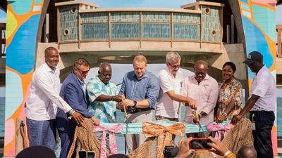 Royal Caribbean Group executives and Bahamian officials cut the ribbon on Royal Beach Club Paradise Island.