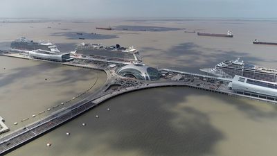 New regulations allow visa-free entry for tour groups arriving at 13 ports around China. Pictured: Shanghai Wusongkou International Cruise Terminal