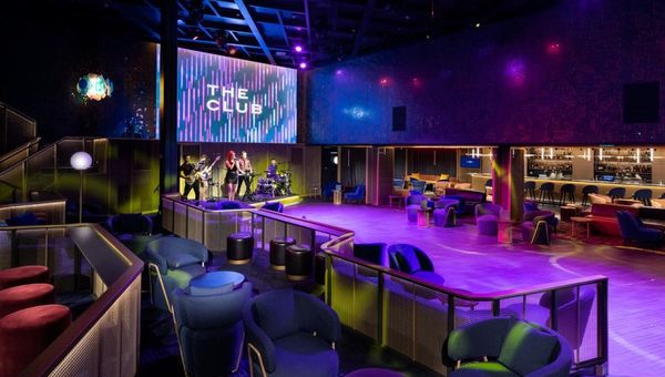 The Club provides an extensive entertainment repertoire, from daily activities to evening events, including an interactive floor-projected game for guests.