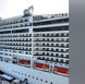 Italian police charge six after MSC Divina’s PA system was hacked.