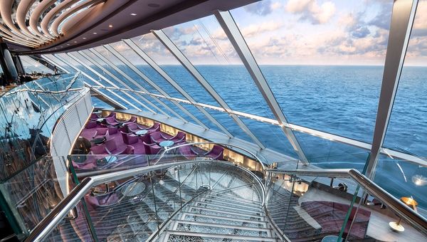 A stairway made of Swarovski crystals leads guests down to the MSC Yacht Club on the MSC Bellissima.