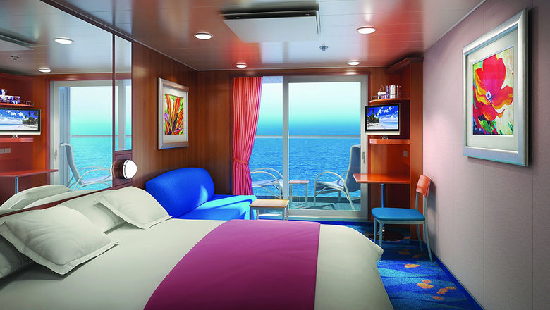 The new interiors of the Balcony stateroom, which include new televisions and USB outlets, and carpet, artwork and furniture.