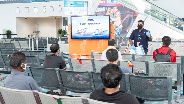Foreign worker dormitory managers are briefed on the features and safety measures of Star Cruises’ SuperStar Gemini and SuperStar Aquarius.