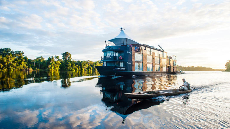 Aqua Expeditions' Aria Amazon (now part of Ponant Expeditions Group) offers luxurious river cruises through the Amazon, with 16 spacious suites, expert-guided excursions, gourmet dining, and breathtaking rainforest views.