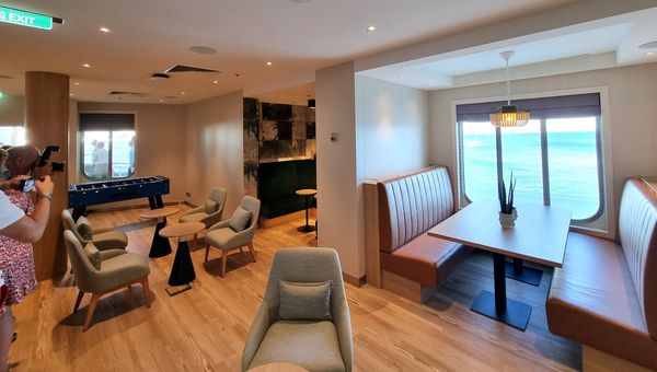 The crew lounge on Silver Nova is equipped with comfortable seating arrangements, a foosball table and a dedicated bar with a bartender. The crew lounge on Silver Nova is equipped with comfortable seating arrangements, a foosball table and a dedicated bar with a bartender.