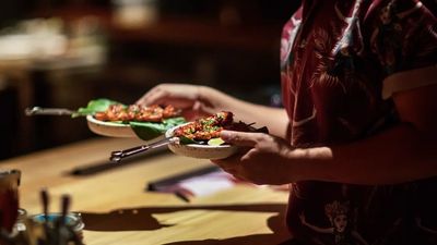 The S.A.L.T. (Sea and Land Taste) program on Silversea cruises enhances travel experiences through regional cuisine, featuring specialised menus, cooking demonstrations, and market tours.